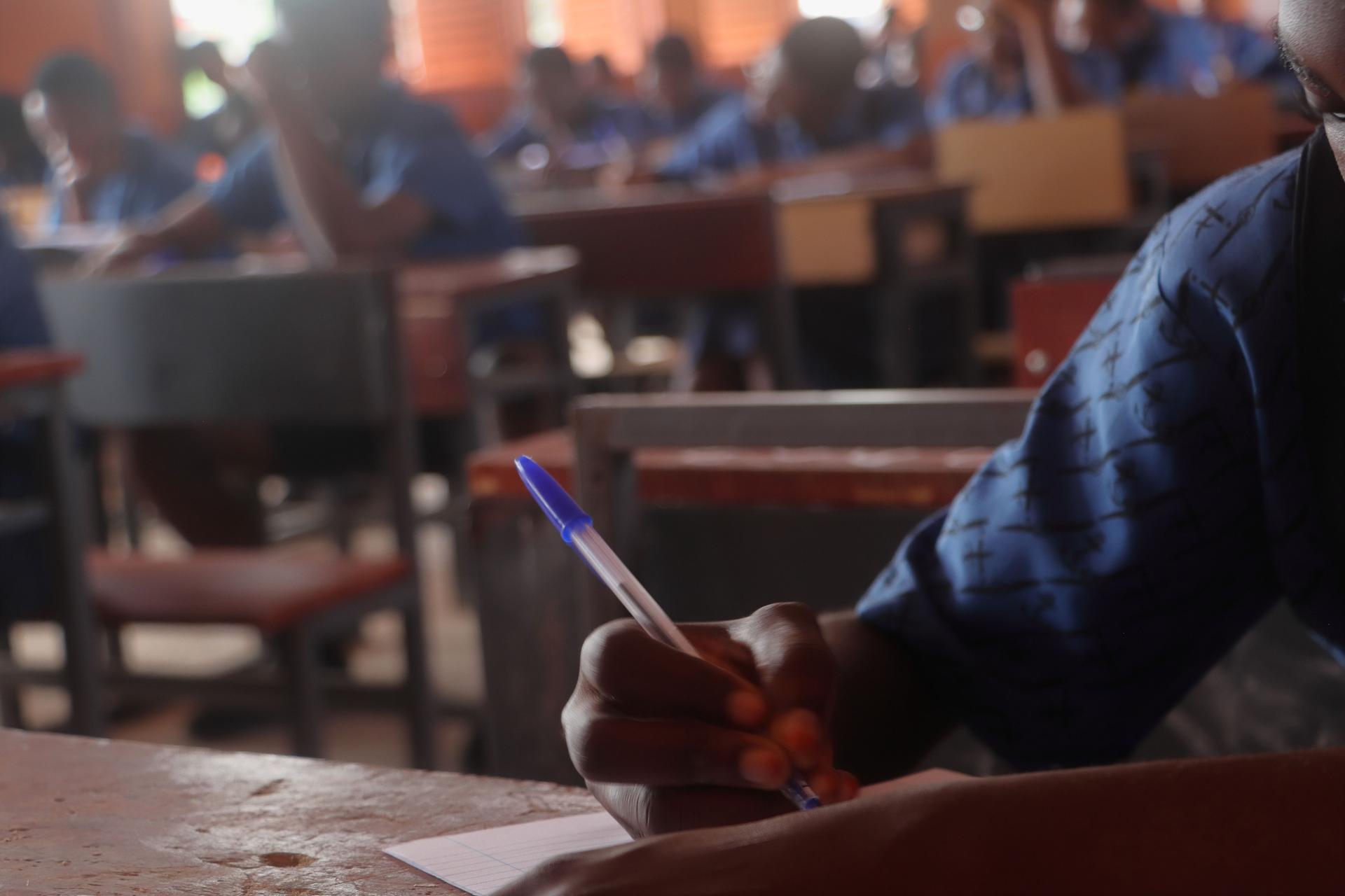 Future Minds: Diligent Ghanaian Student During National Exams